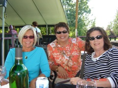 Nancy
                  Airaksinen, Deb Preciano and Jane Norton tasting Ohio
                  wines and comparing impressions