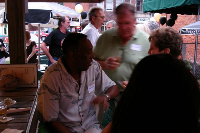 James Green chats with Bob Sheer and his wife.